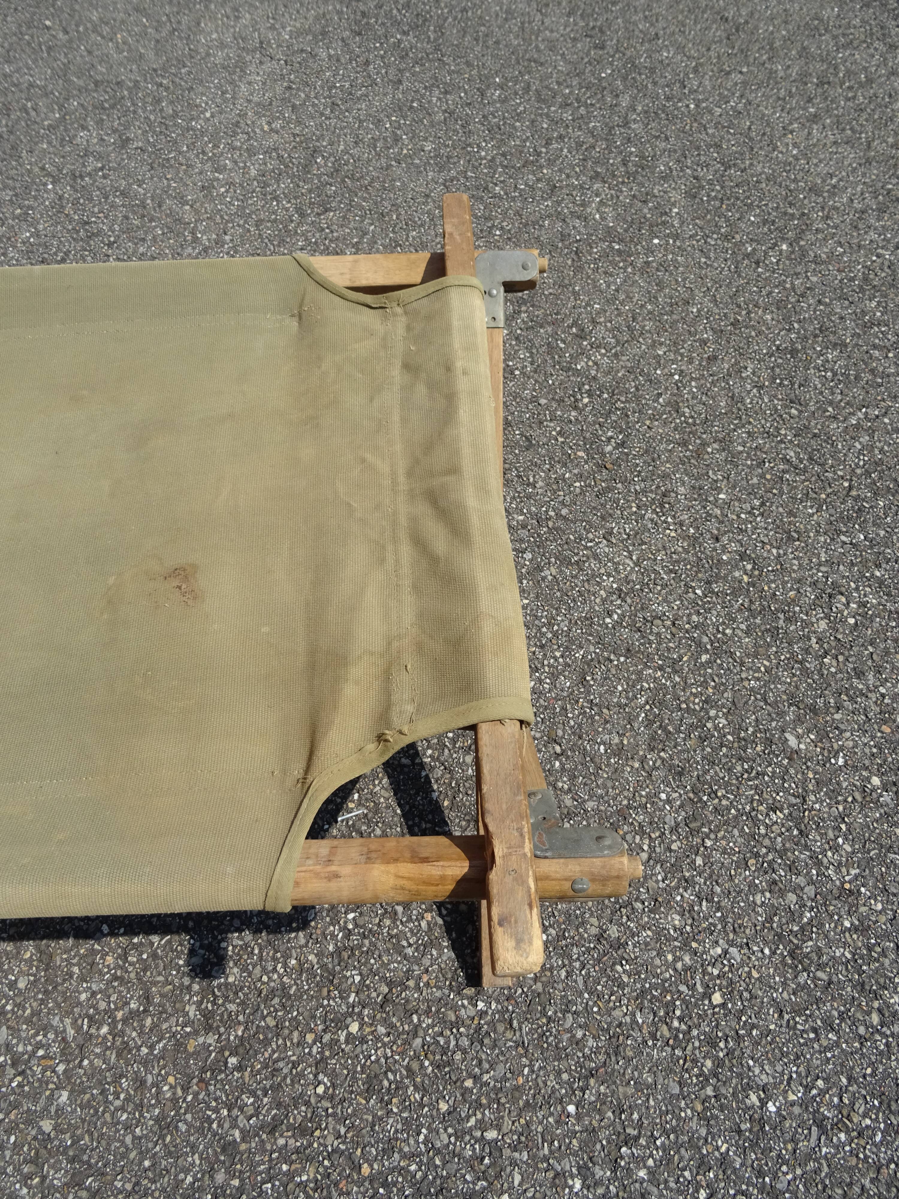 Khaki military camp bed