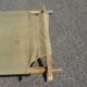 Khaki military camp bed