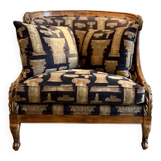 Armchair in a wooden confessional style with black and beige cotton.