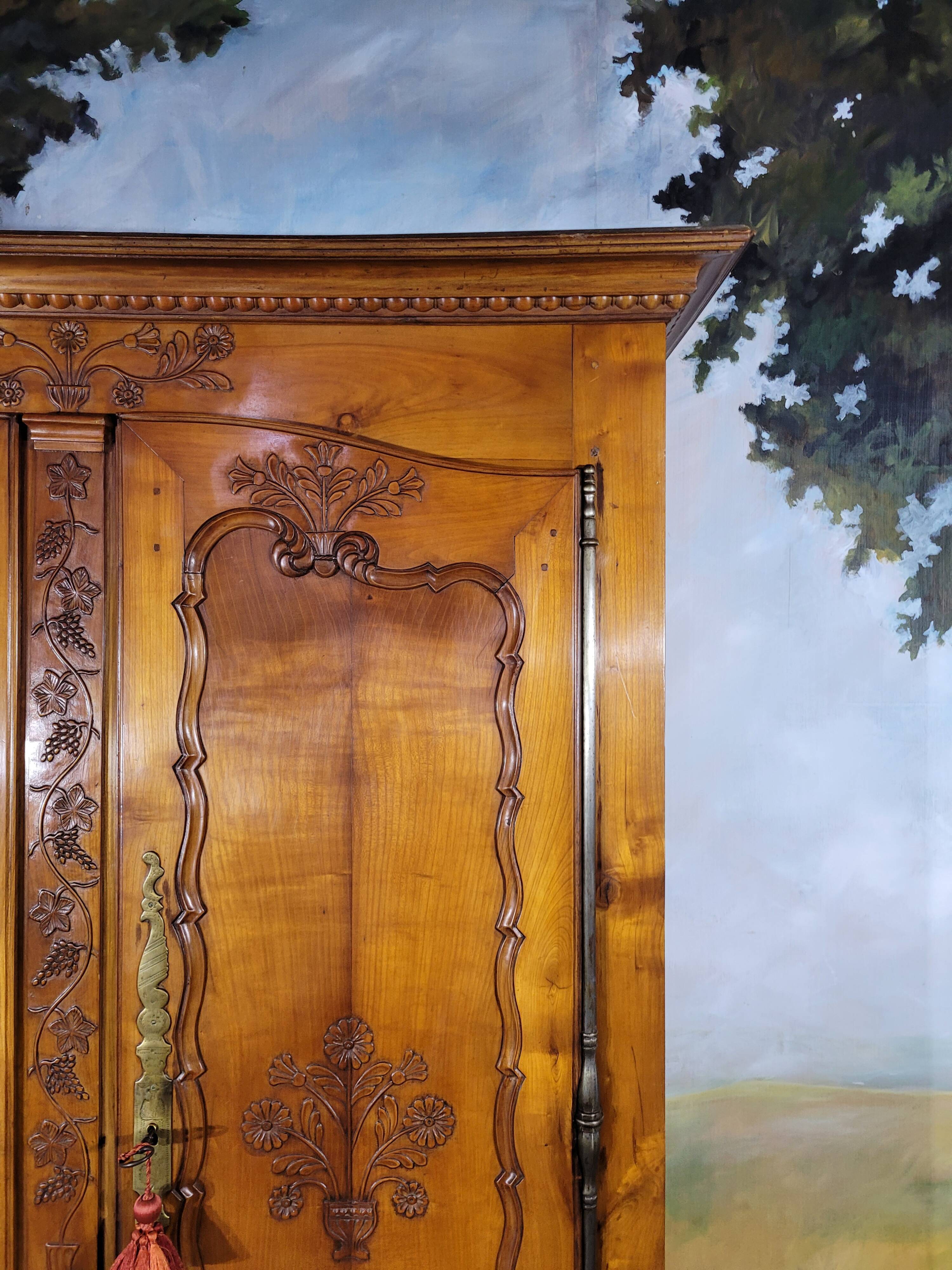 Louis XV style carved cherry wood armoire