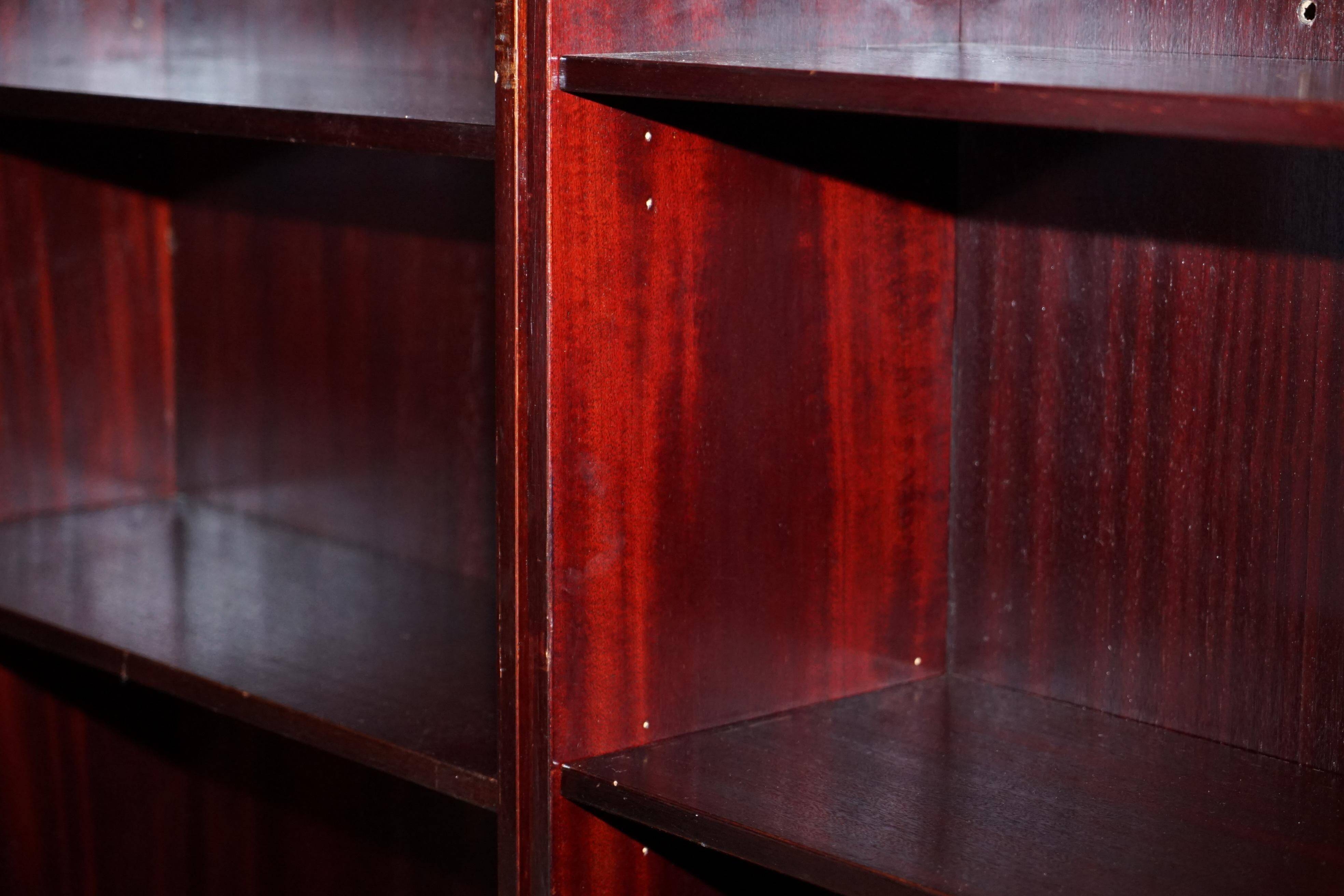 Three vintage style Military Campaign bookshelves, mahogany finish.