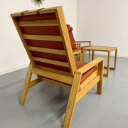 Scandinavian design lounge set in pine with 3 lounge chairs and a table from the 70s.