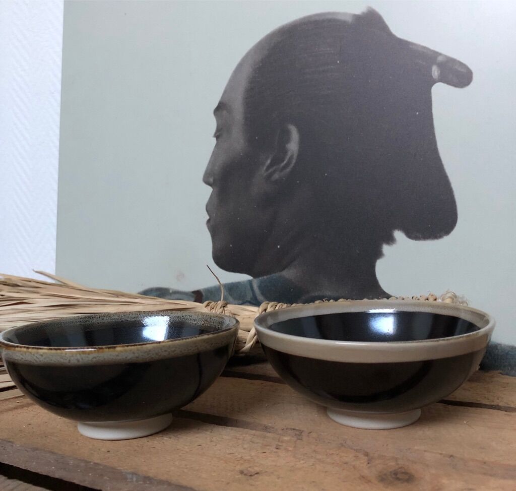 Lot of black ceramic-style bowls