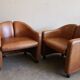 Pair of leather armchairs by Eugenio Gerli