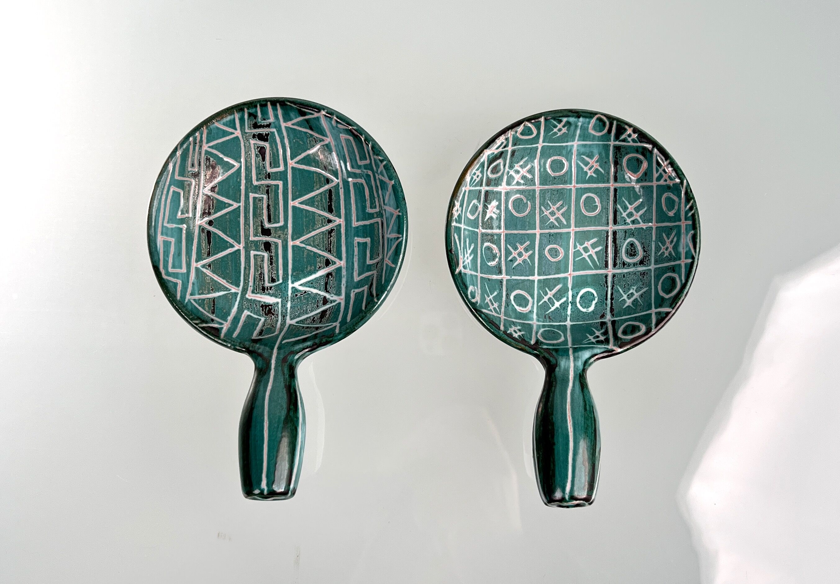 Pairs of ceramic pans by Robert Picault