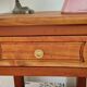 Low cherry wood furniture in Directoire style.