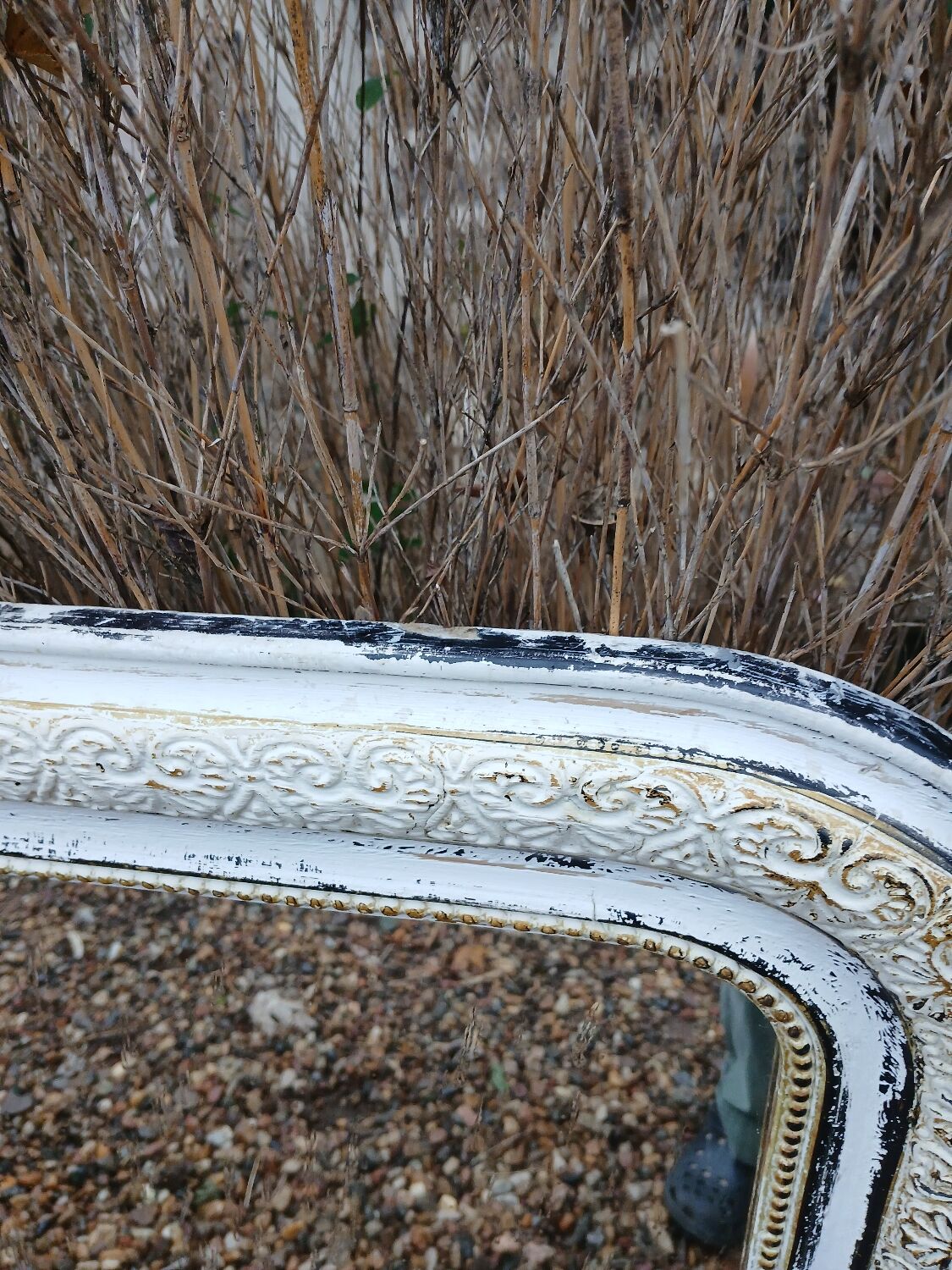 Antique mirror with carved wooden frame
