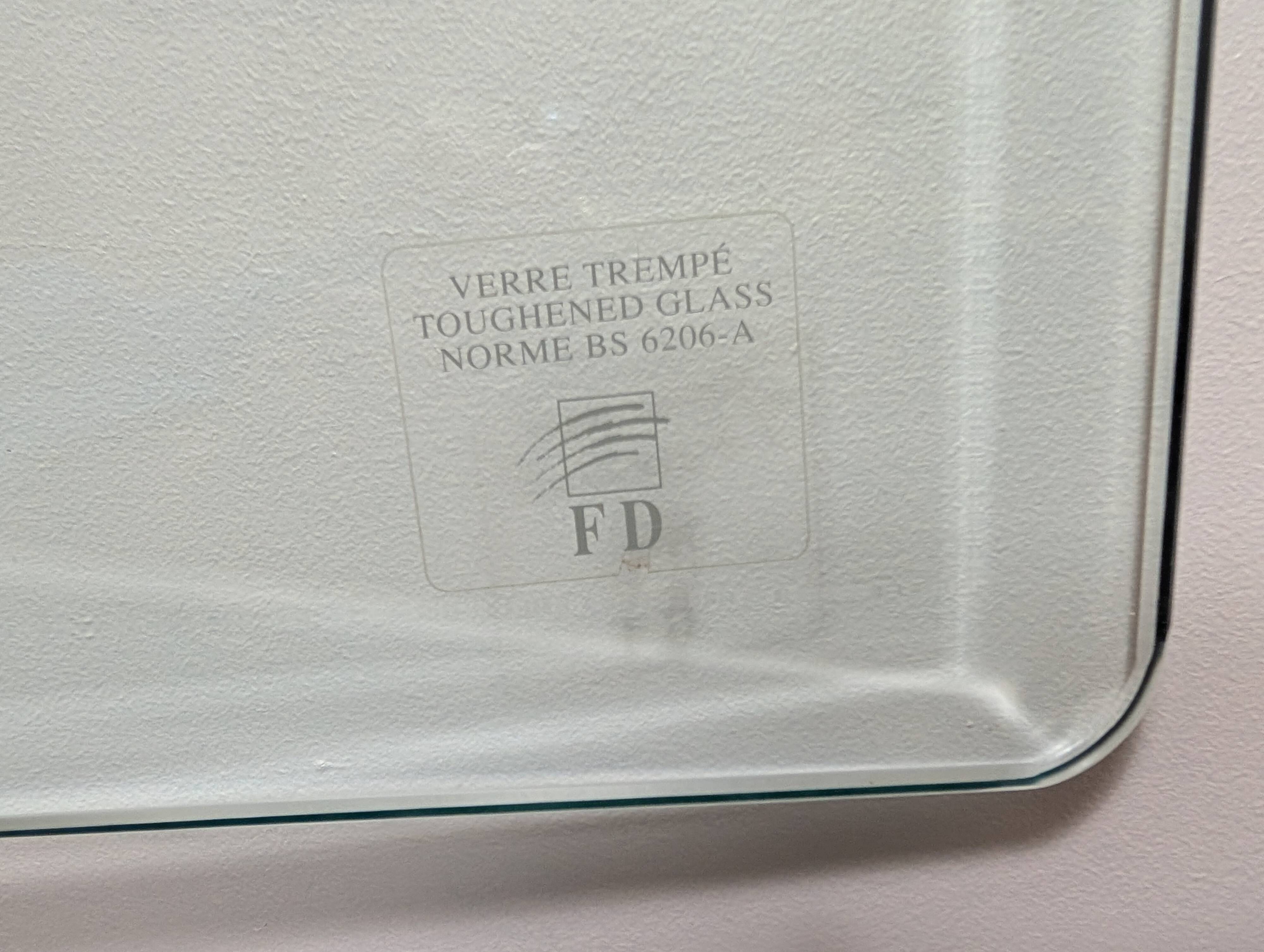 Wrought iron and glass coffee table