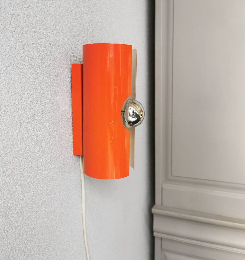 Raak Amsterdam orange wall applique from the 1970s