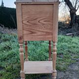 Raw wood bedside table