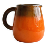 Orange ceramic pitcher