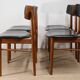 Set of 4 Scandinavian chairs in teak and black faux leather – 1960s