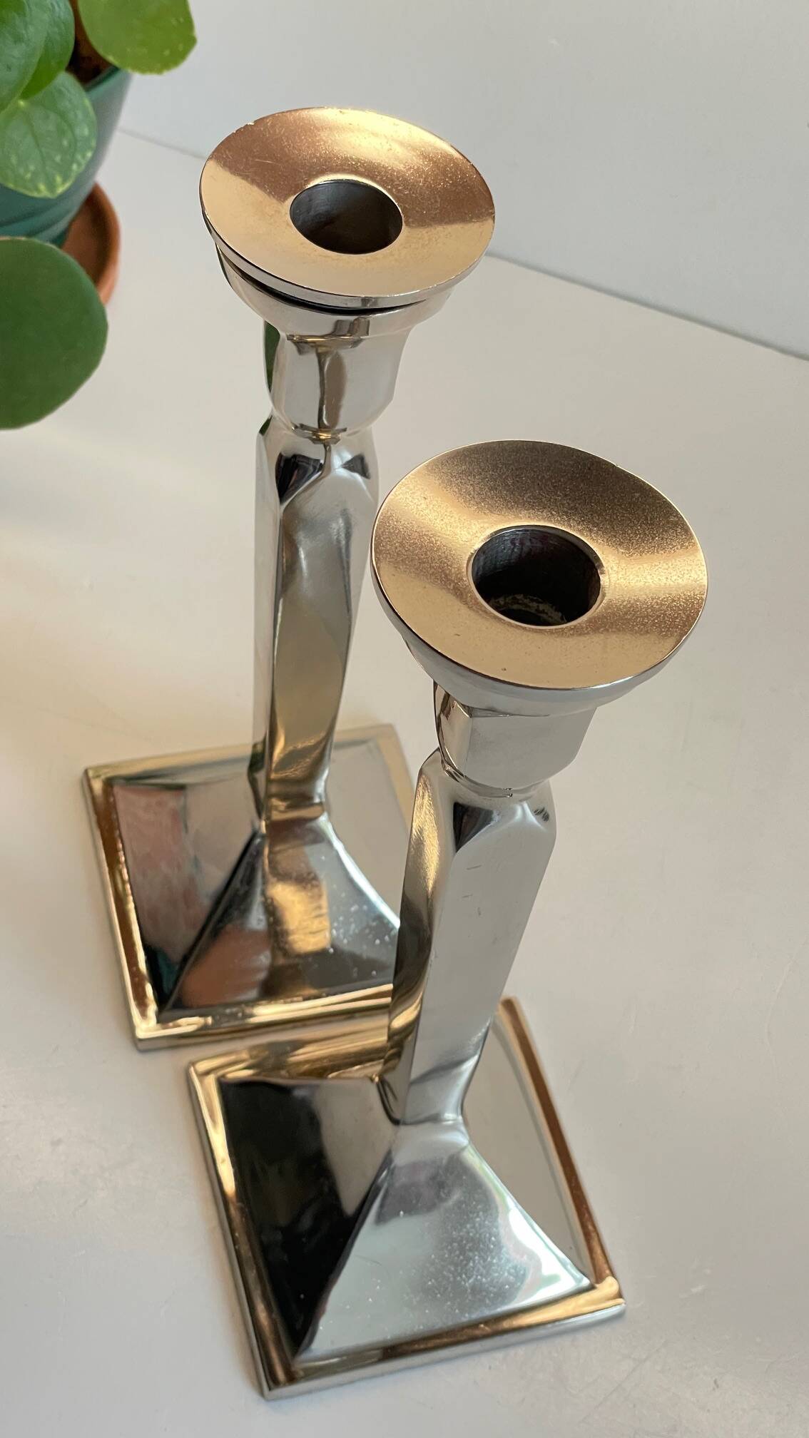 Pair of vintage cast aluminum candlesticks