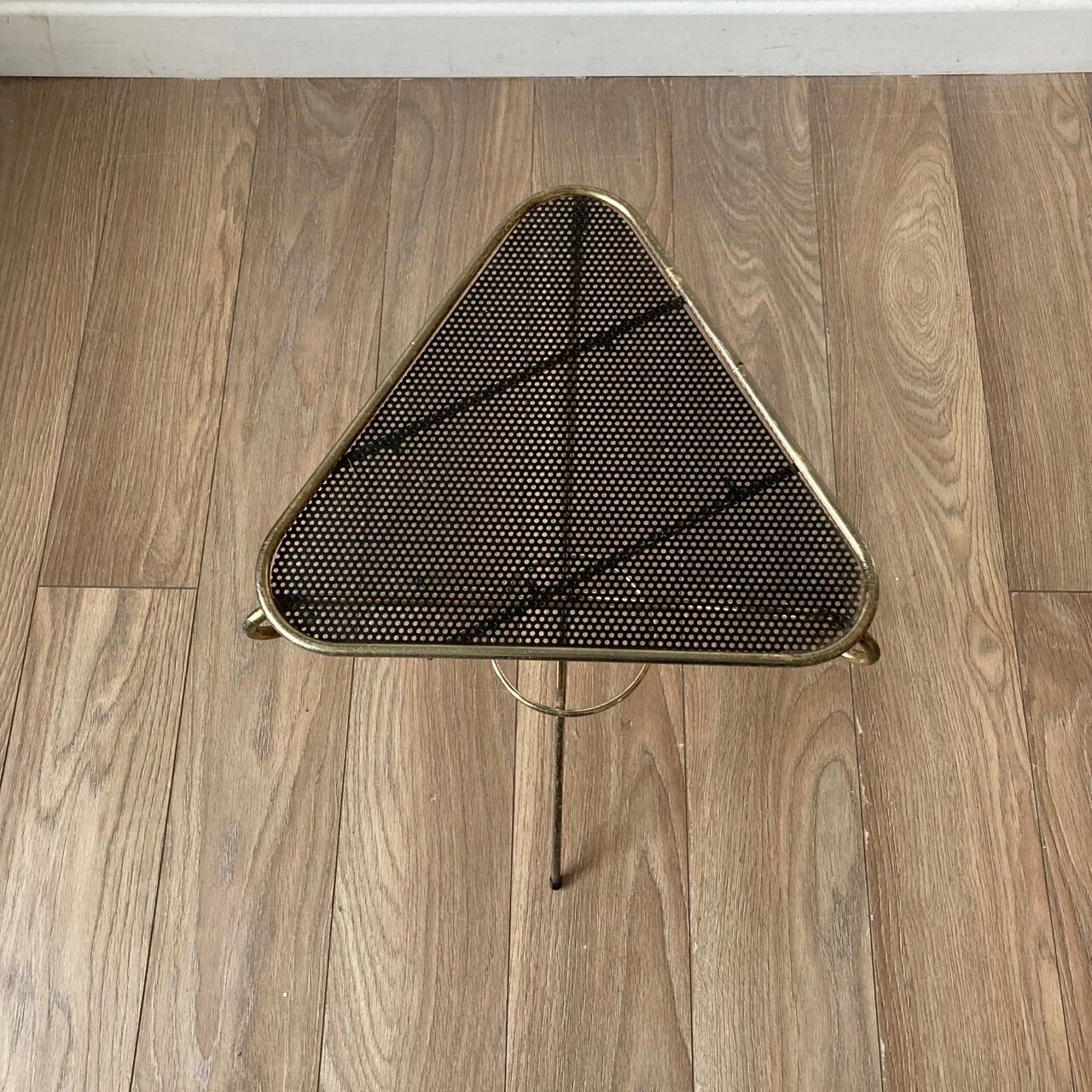 Perforated metal tripod harness