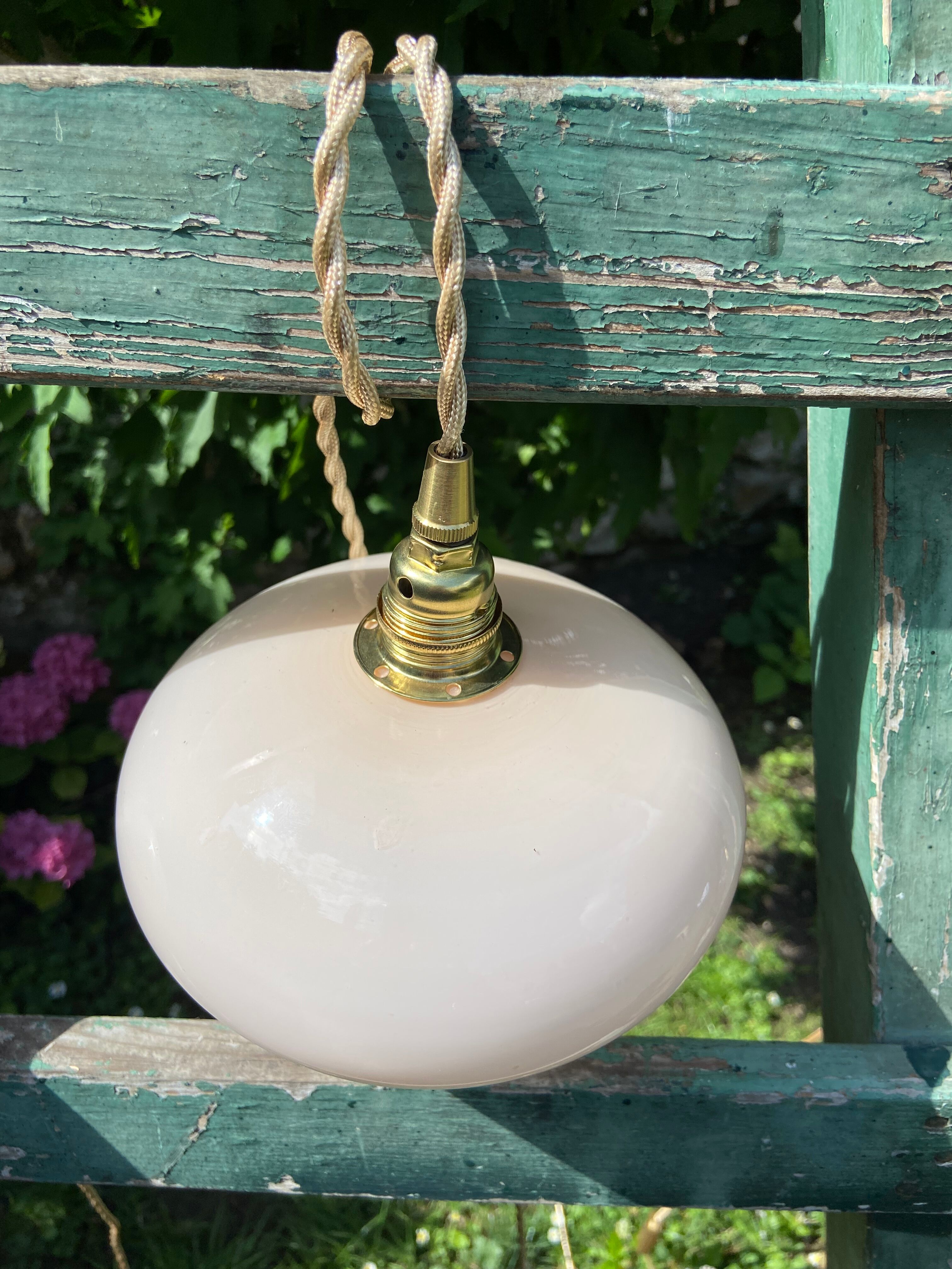 Vintage powder pink opaline globe player 1950