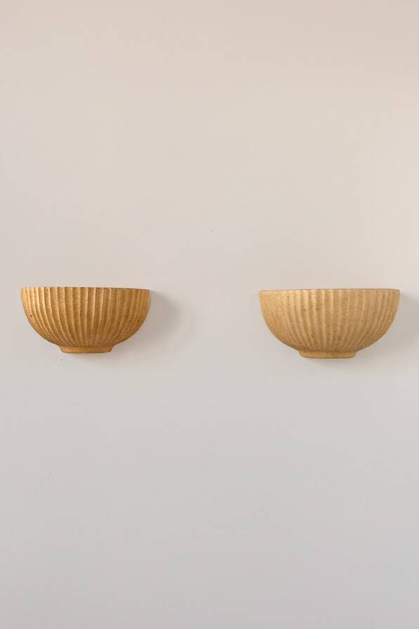 Pair of vintage beige ceramic wall lights, France, 1970.