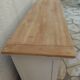 Craft furniture enhanced in pearl gray, shelves and top in raw wood.