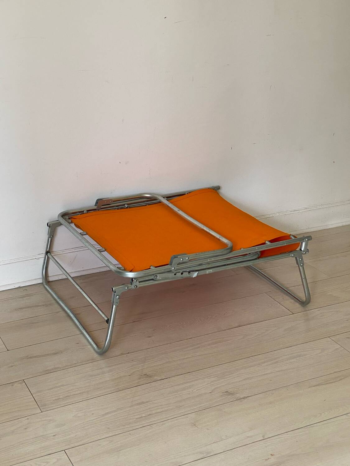 Orange and metal deckchair 1970