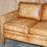 Two-seater leather canapé, hand-tanned, Edwardian style with studs.