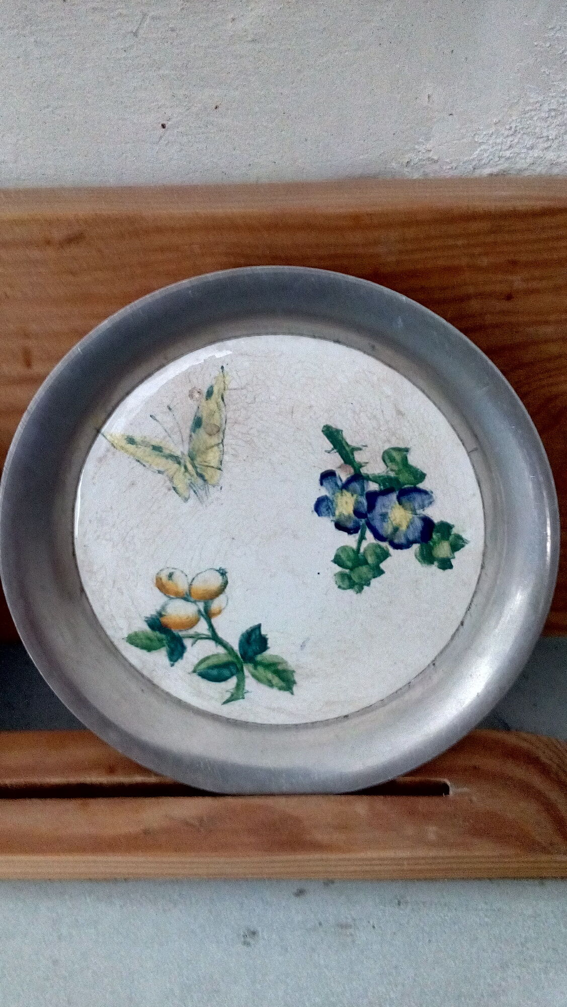 Duo of sub bouteilles or metal and ceramic coasters