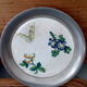 Duo of sub bouteilles or metal and ceramic coasters
