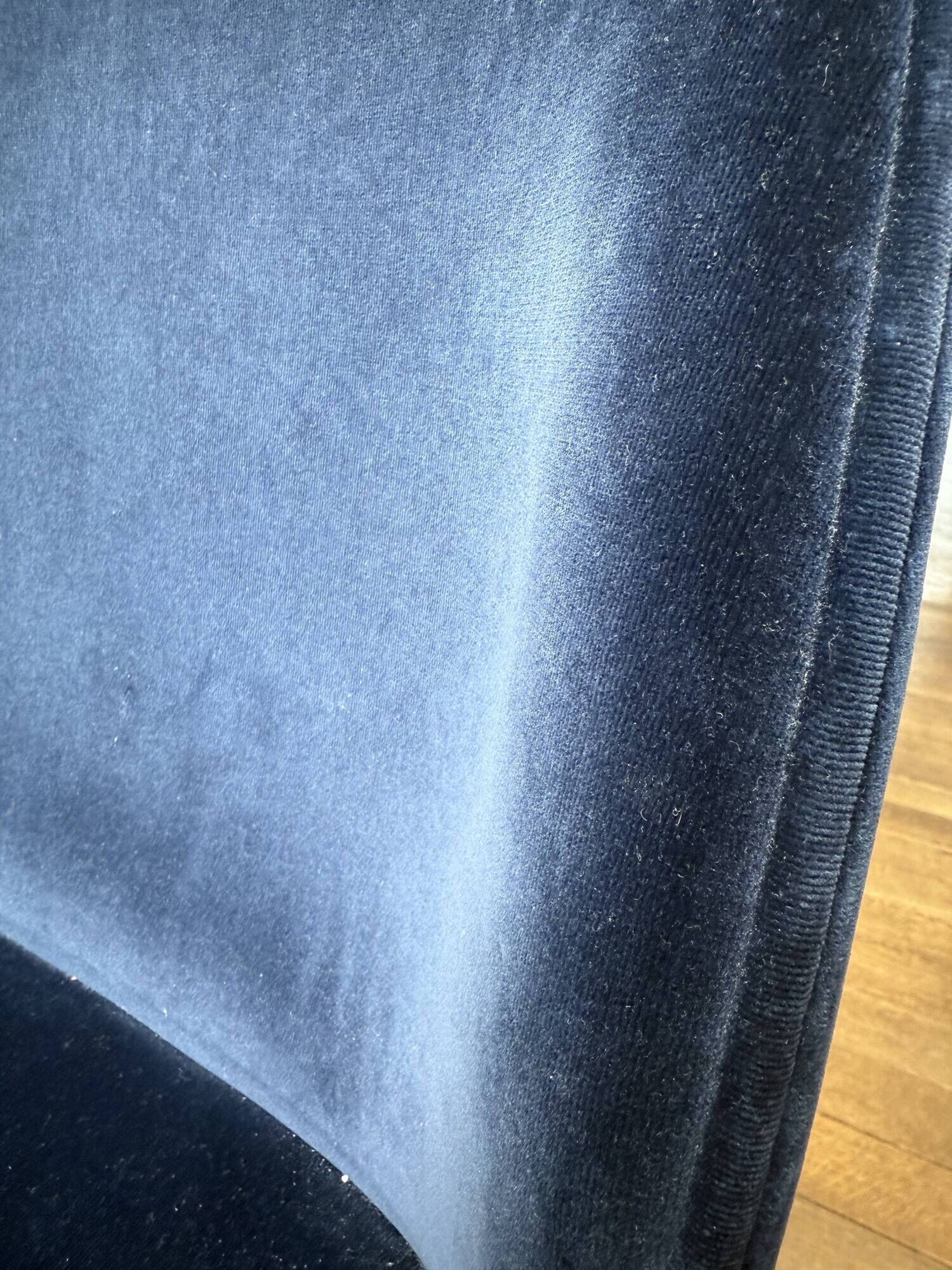 GUBI Beetle designer chair in midnight blue velvet with brass base