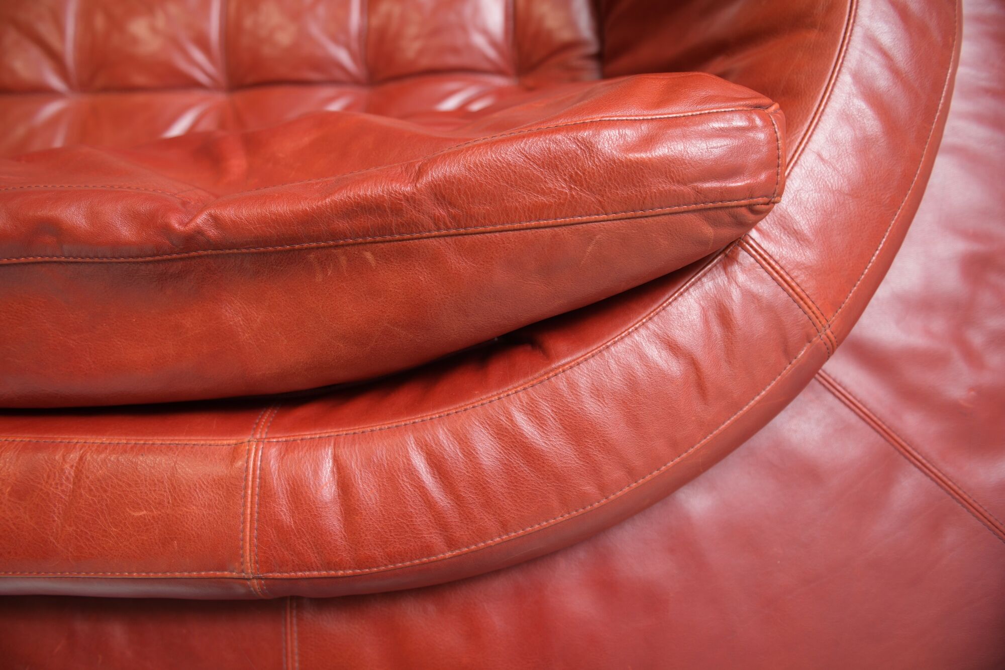 Vintage Osaka loveseat in oxblood leather by Natuzzi Italy
