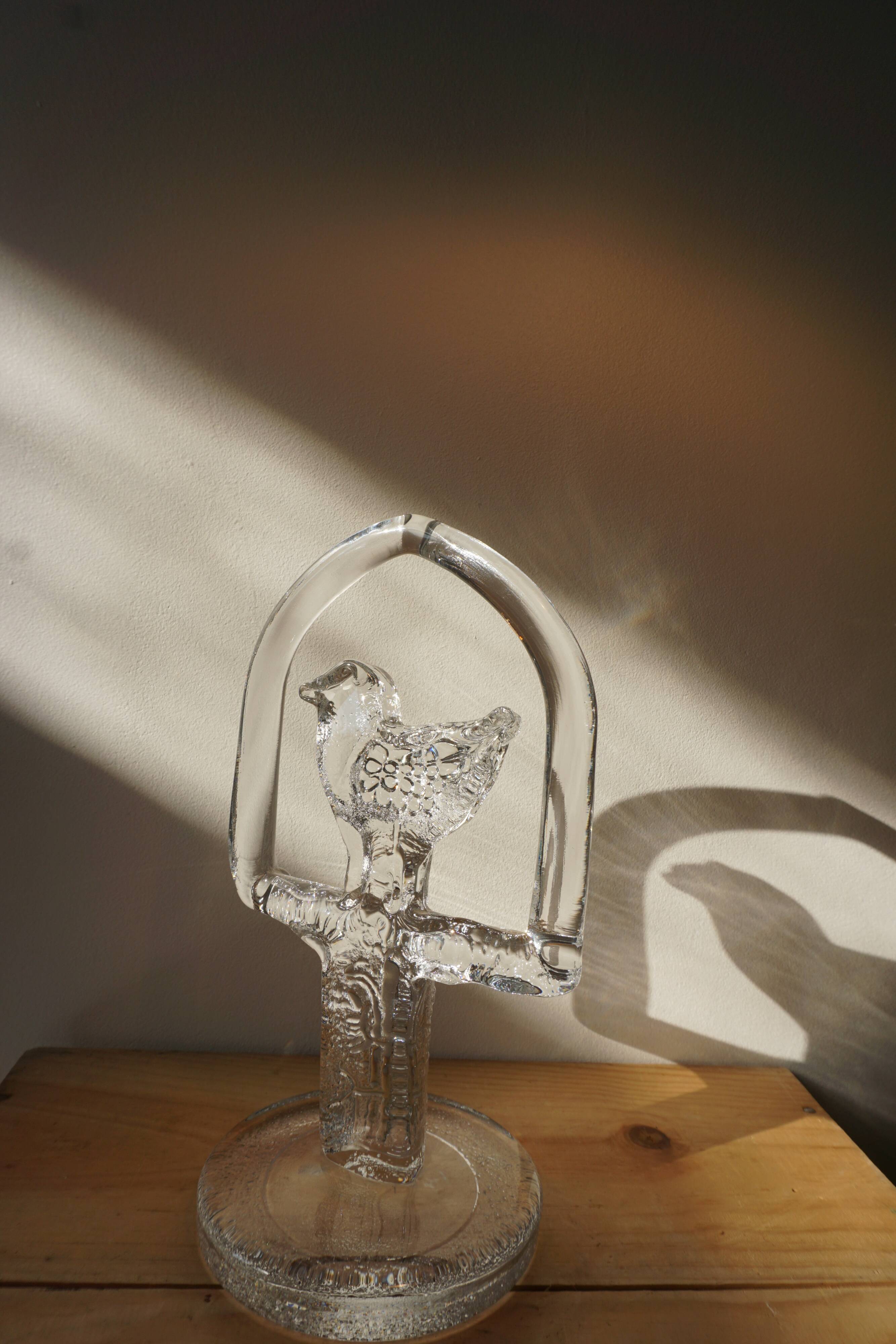 Glass bird suncatcher sculpture