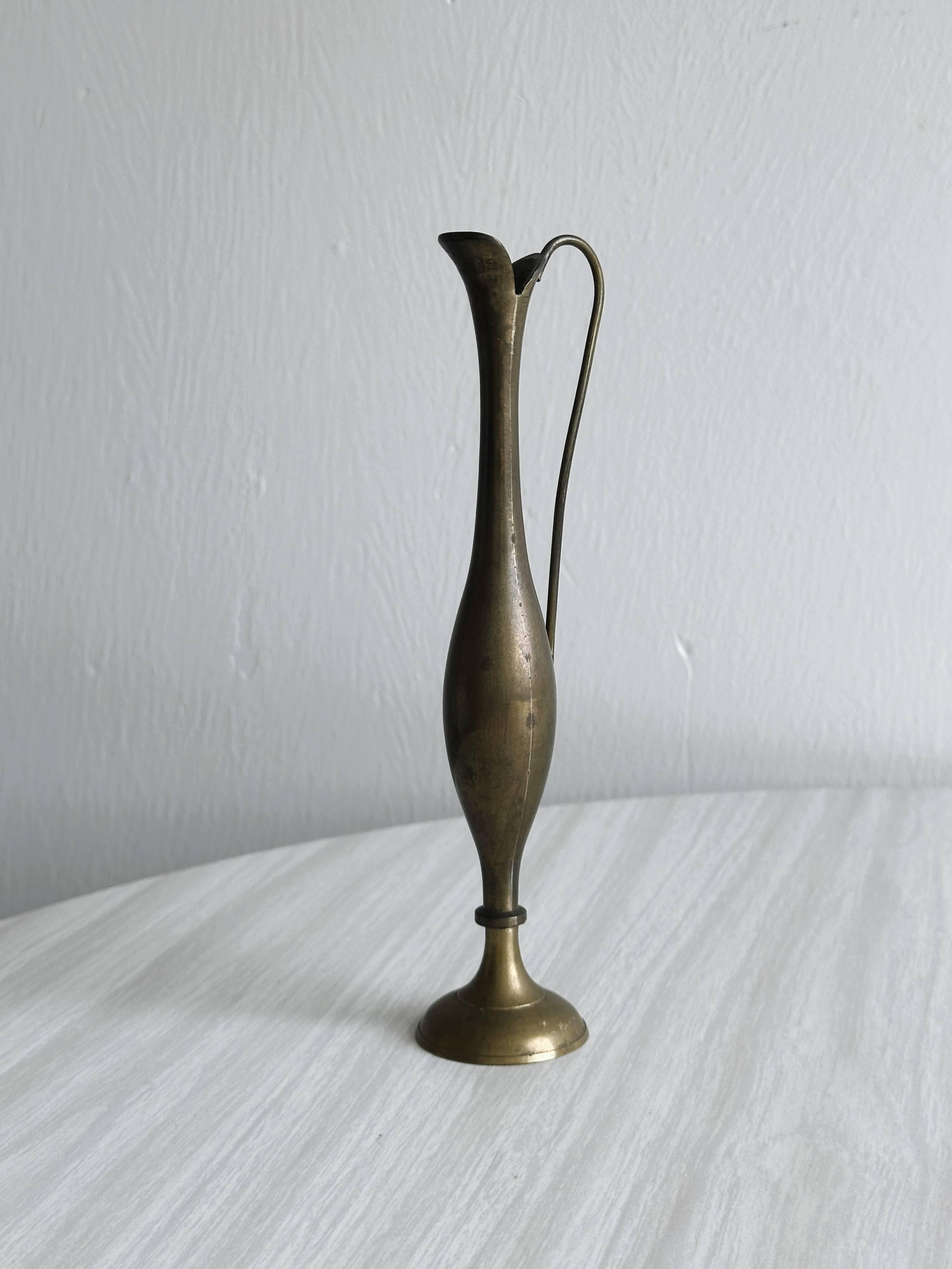 Brass soliflore.