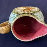 Small onnaing barbotine jug with lion decoration