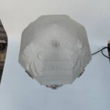 Art Nouveau style lamp, in bronze and frosted glass.
