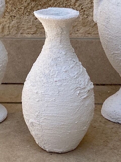 Trio of white vases