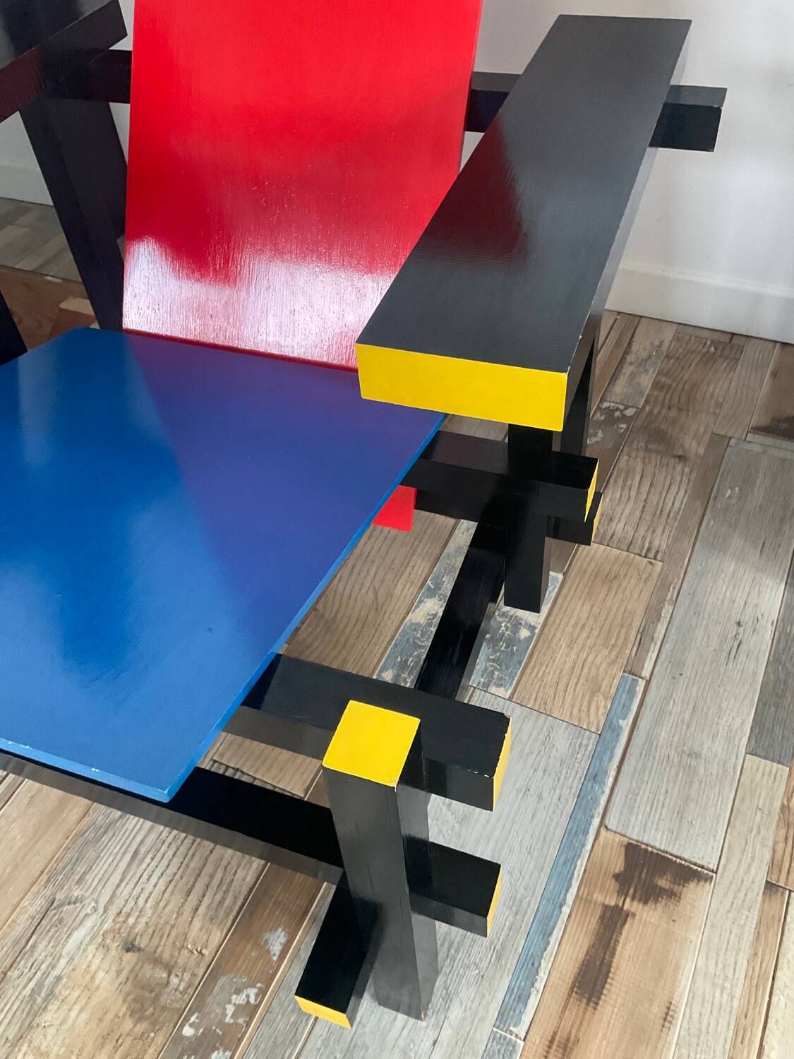 “Red and blue” lounge chair in the style of Gerrit Rietveld