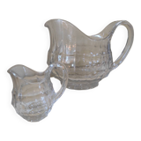 2 antique glass pitchers