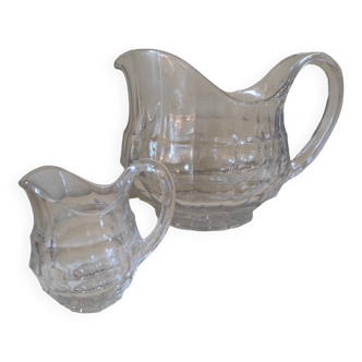 2 antique glass pitchers