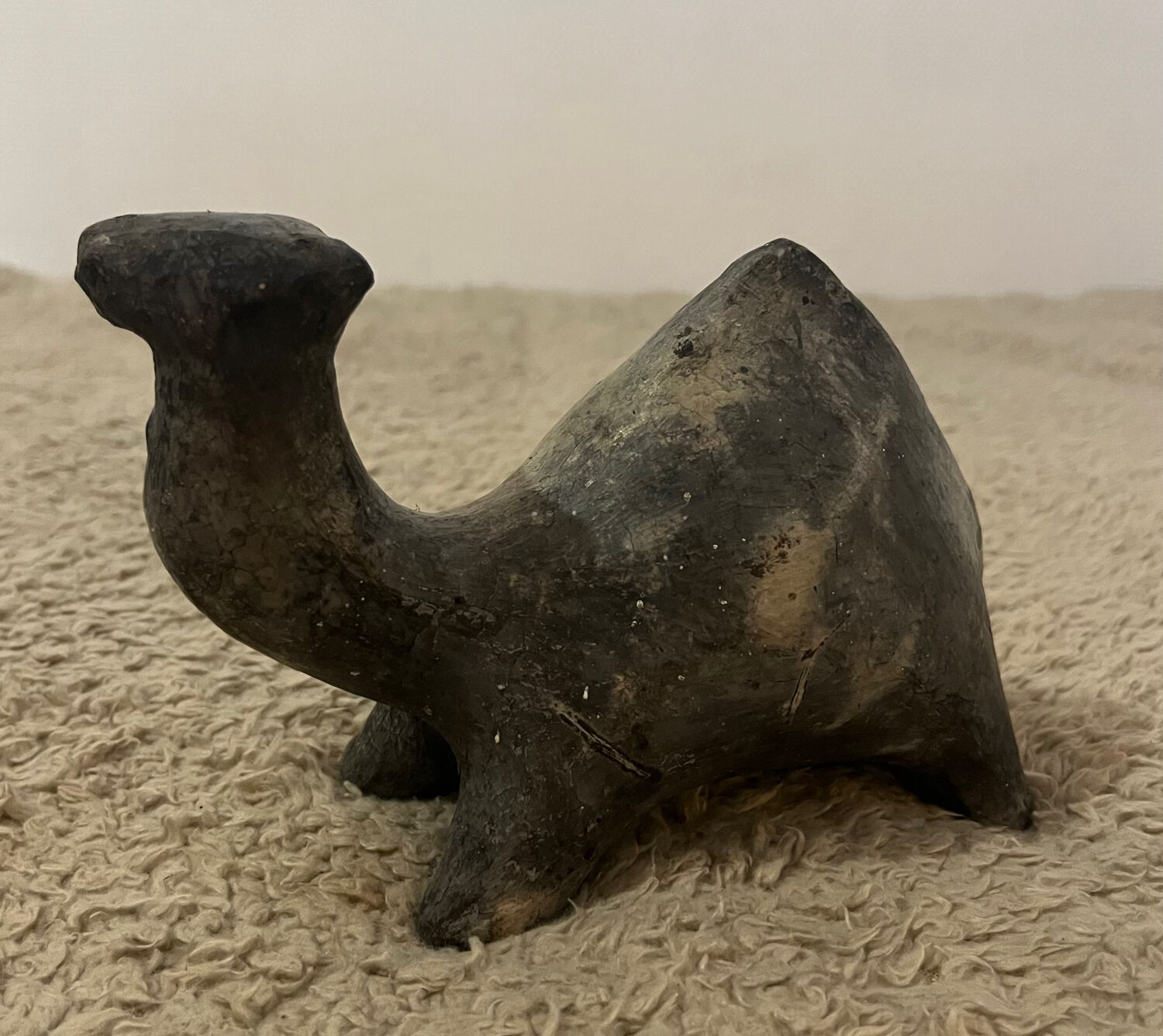 Ceramic camel statuette