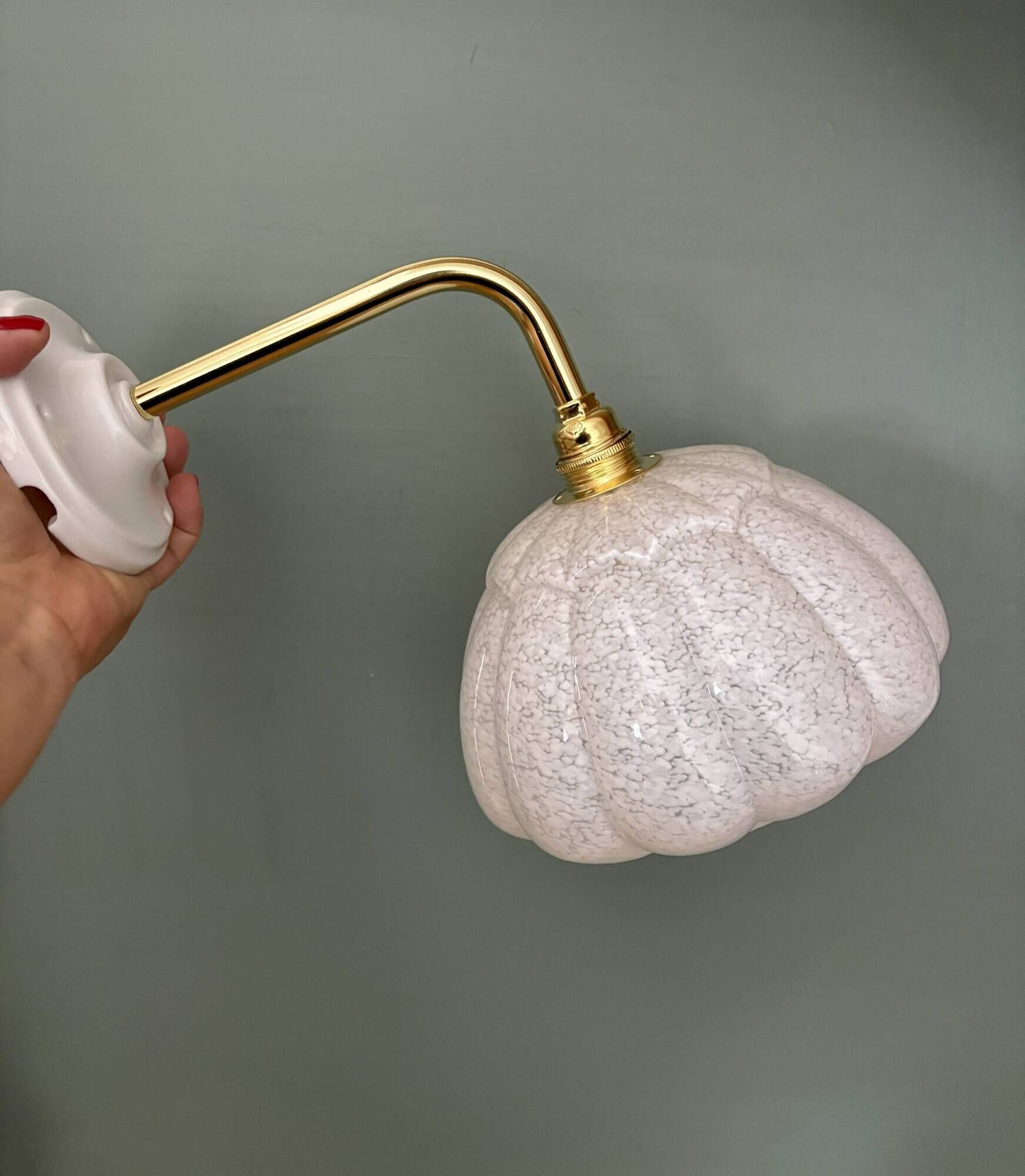 Vintage glass wall light with a curved arm from Clichy, white.