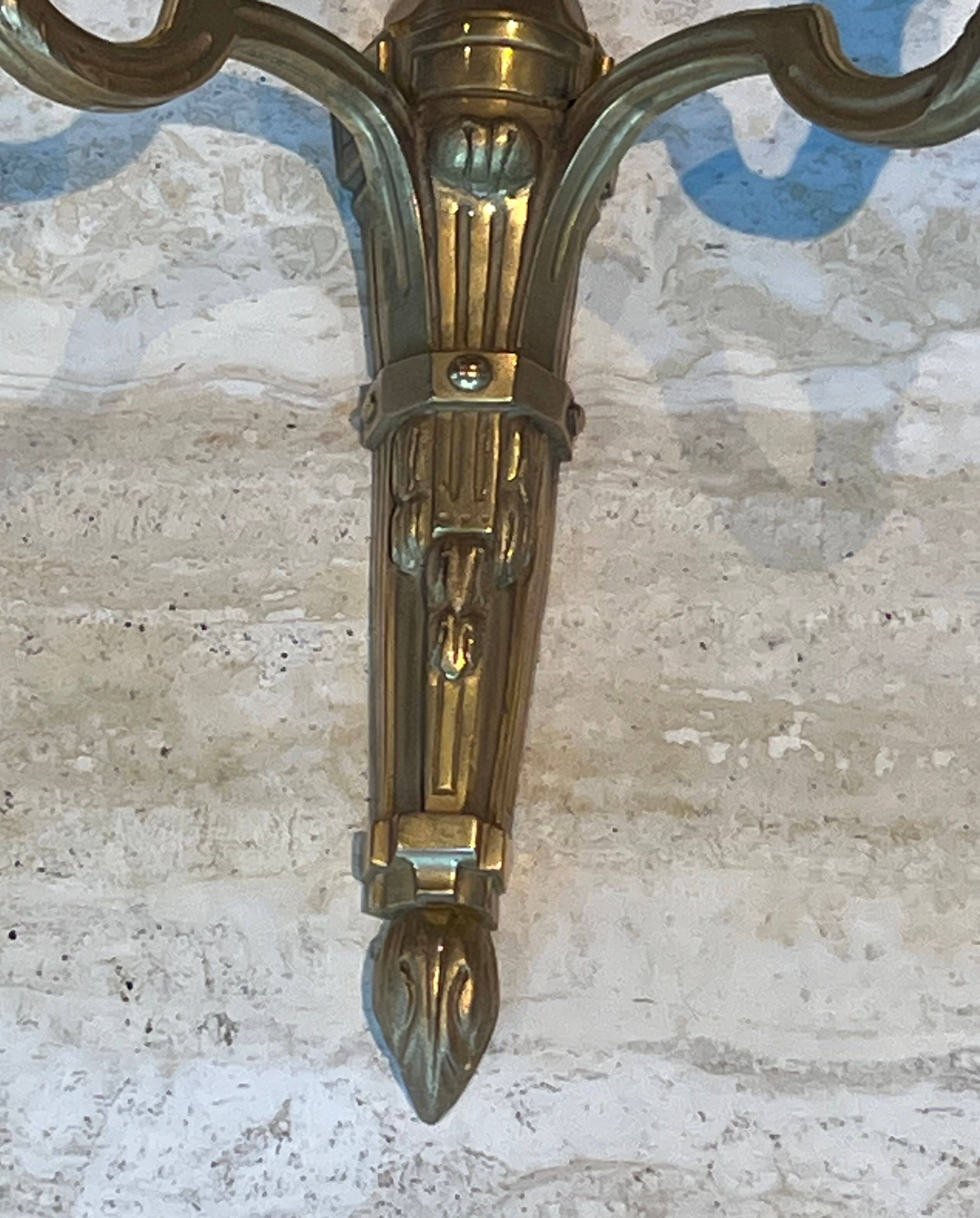 Set of 4 bronze wall lights in Louis XVI style.