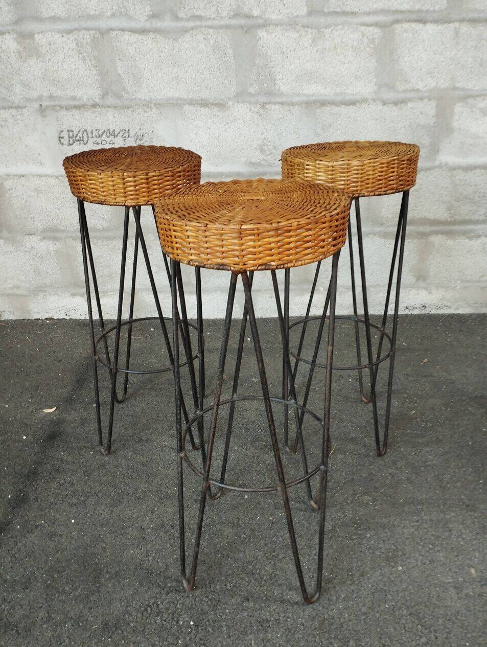 Vintage rattan and metal bar and its stools.