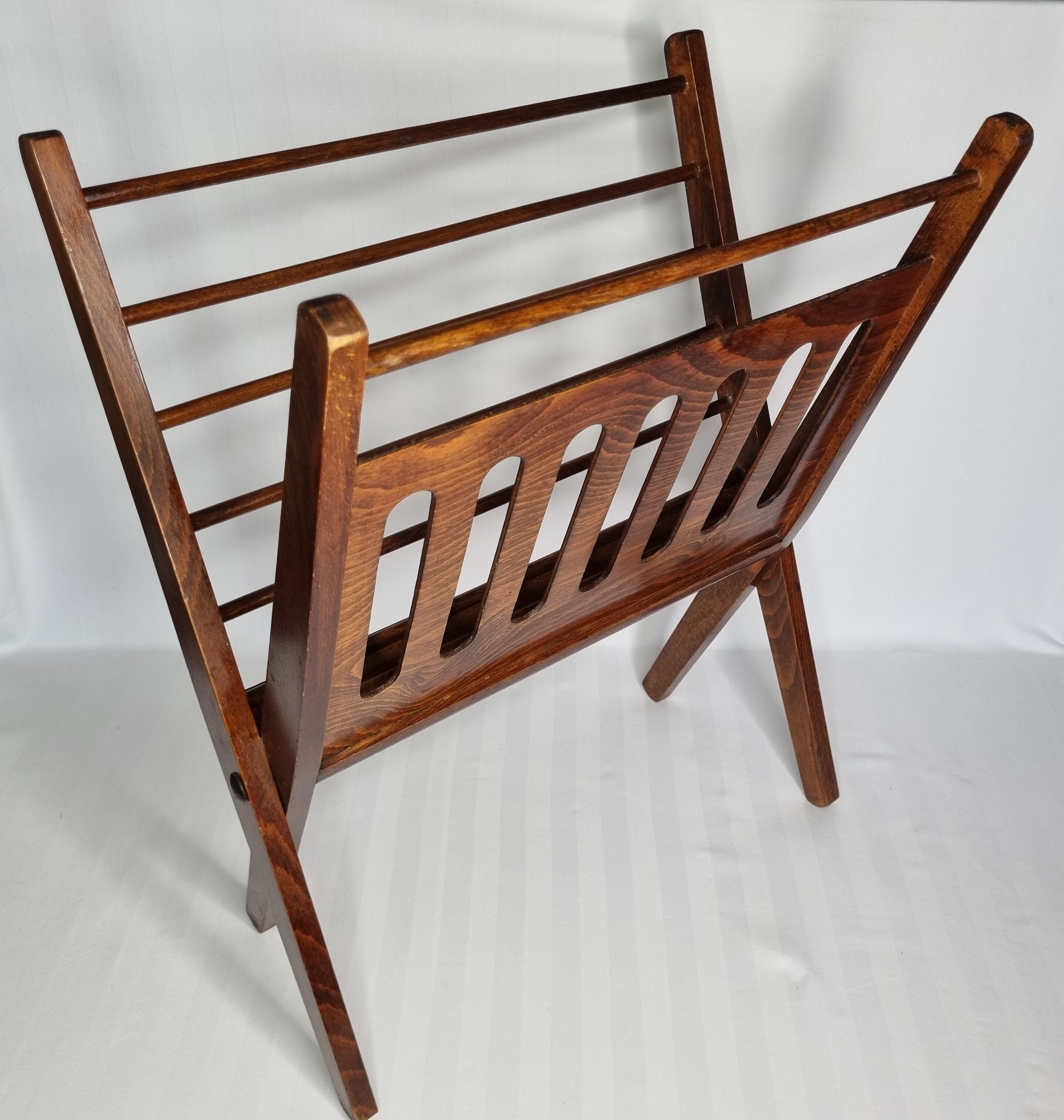 Folding teak magazine holder by Cees Braakman