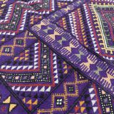Hand-woven purple margoum rug in natural wool