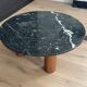 Black marble coffee table with wooden legs