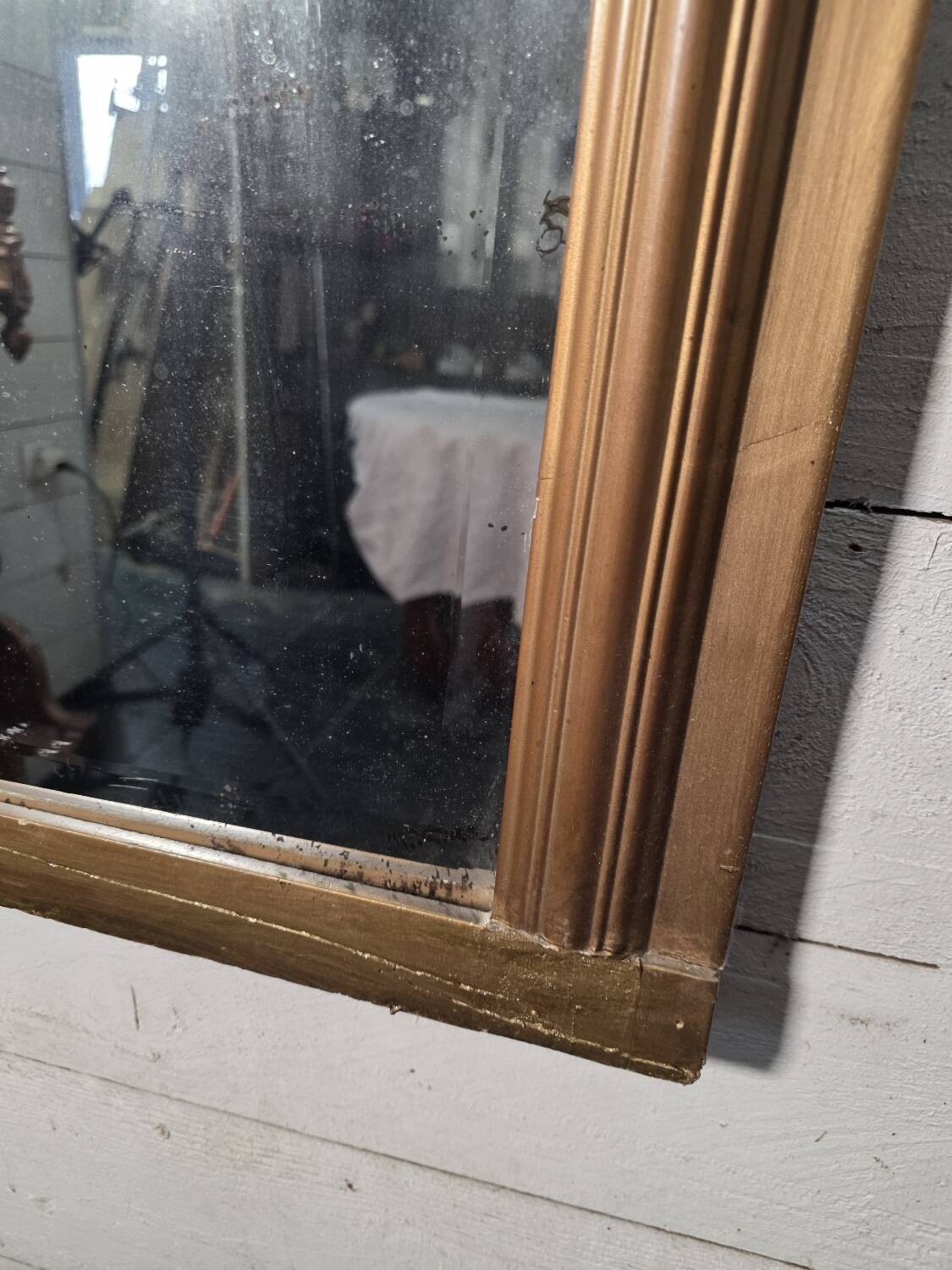 Art Deco gilded trumeau, bevelled mirror