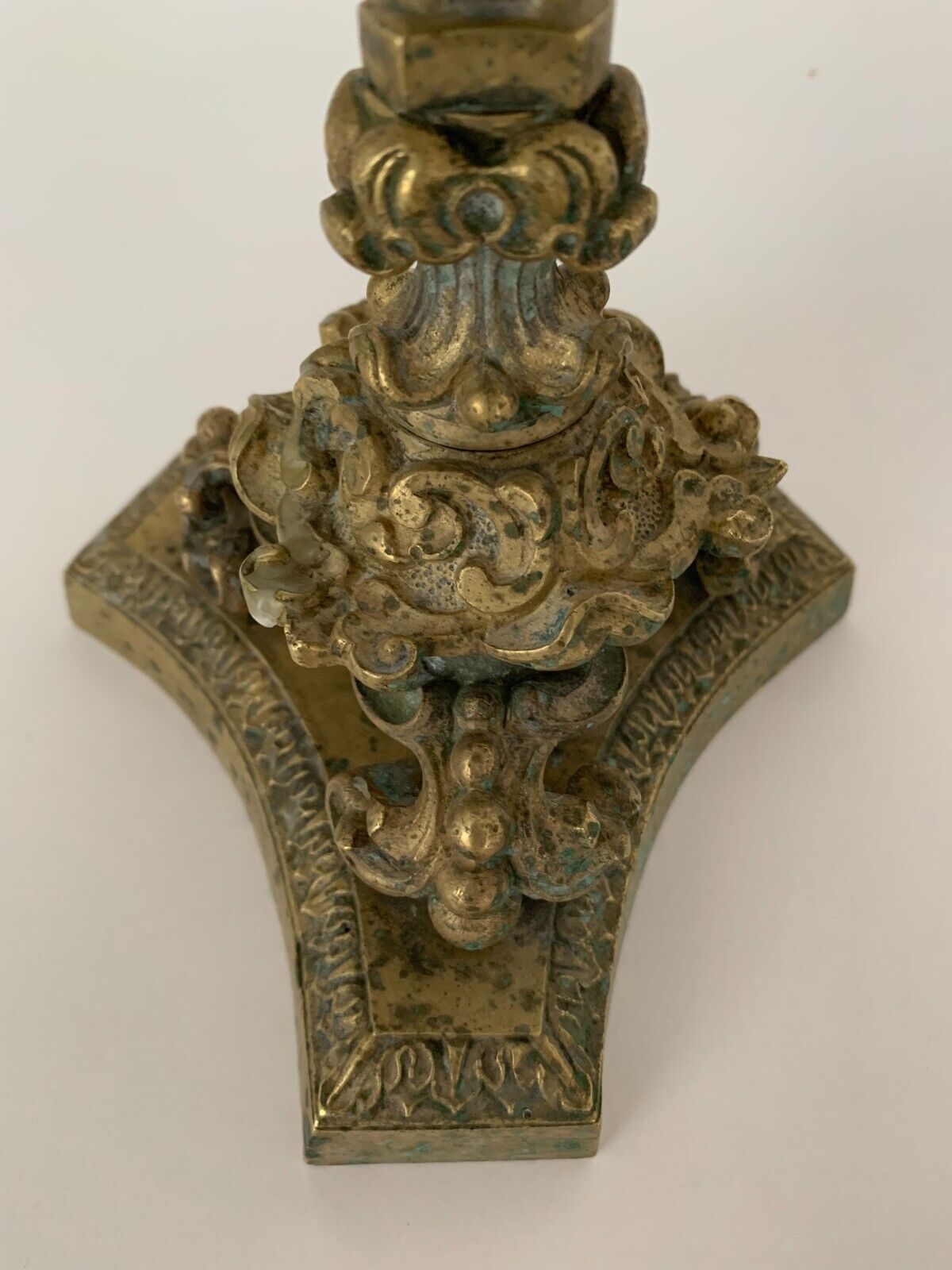 Pair of bronze candle holders with neogothic nineteenth chiseling