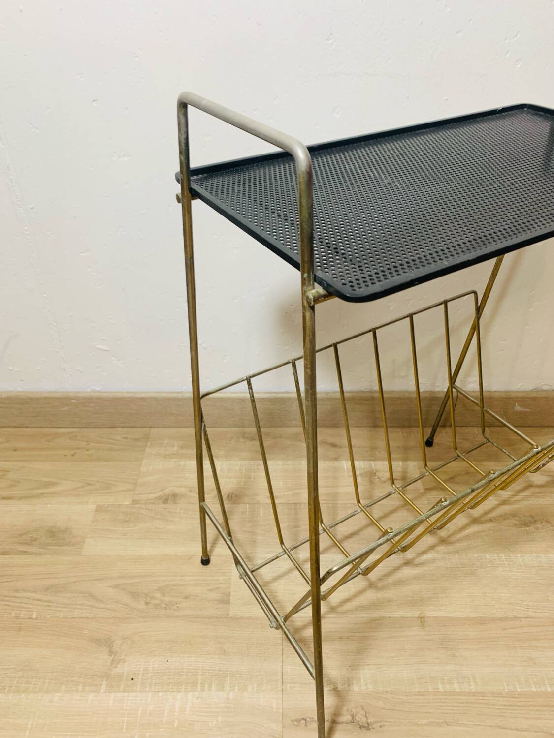 Perforated metal magazine rack