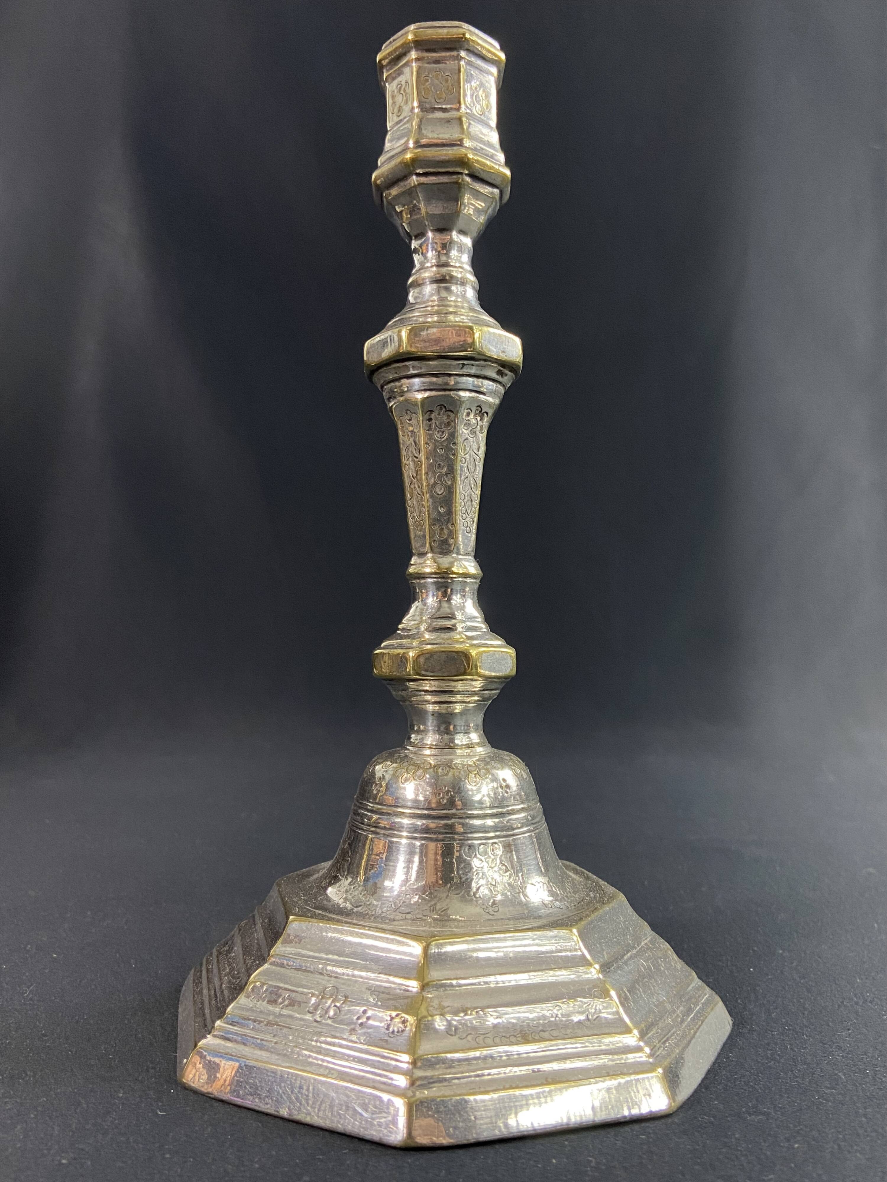 18th century Regency candlestick in silvered bronze with chiseled floral decoration