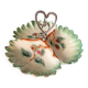Beggar or servant in barbotine with fruit decoration heart handle