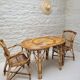 Vintage Audoux Minet bamboo, rattan, and smoked glass table duo.