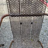 Pair of perforated metal armchairs by René Malaval 1950