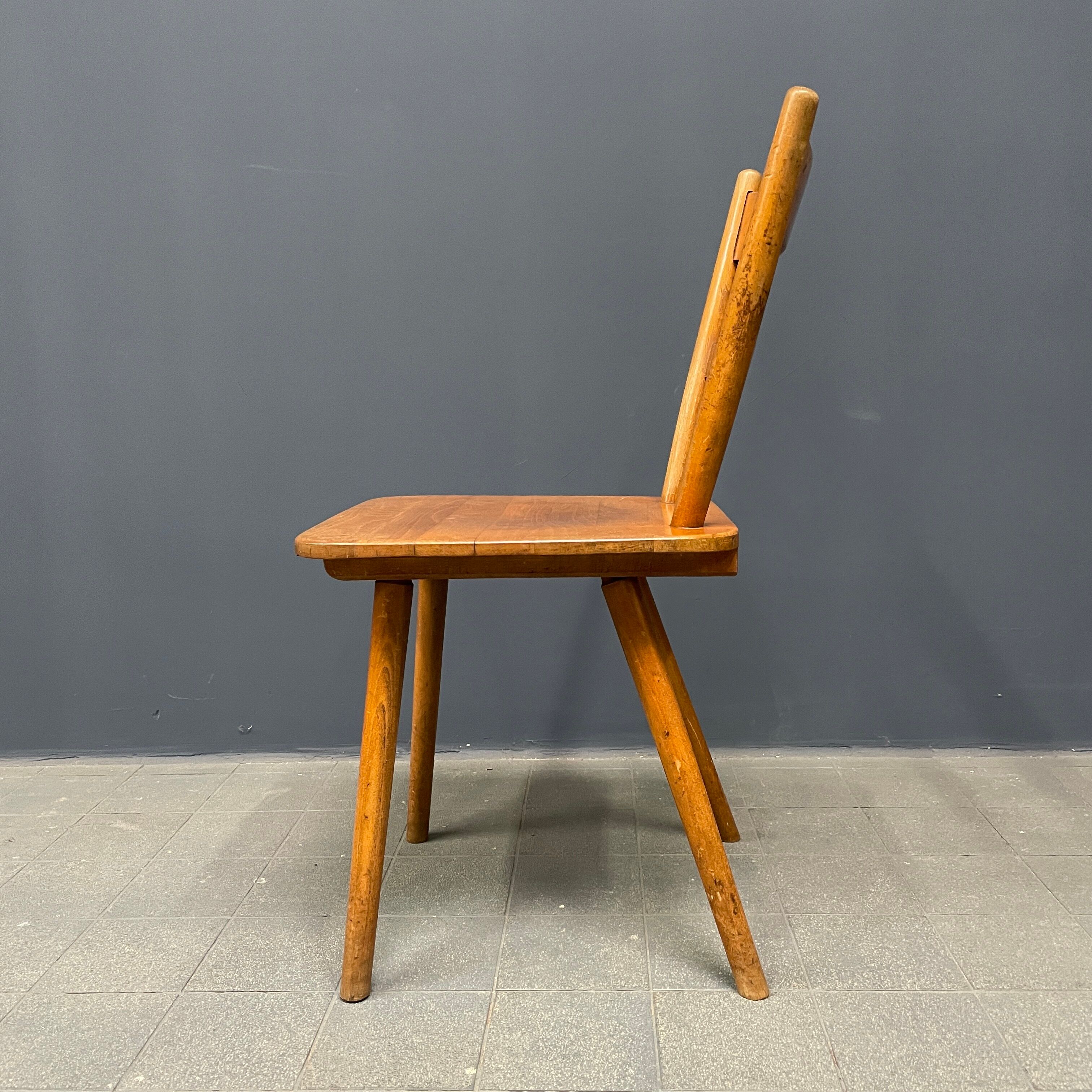 Set of eight german stick chairs from the 1950